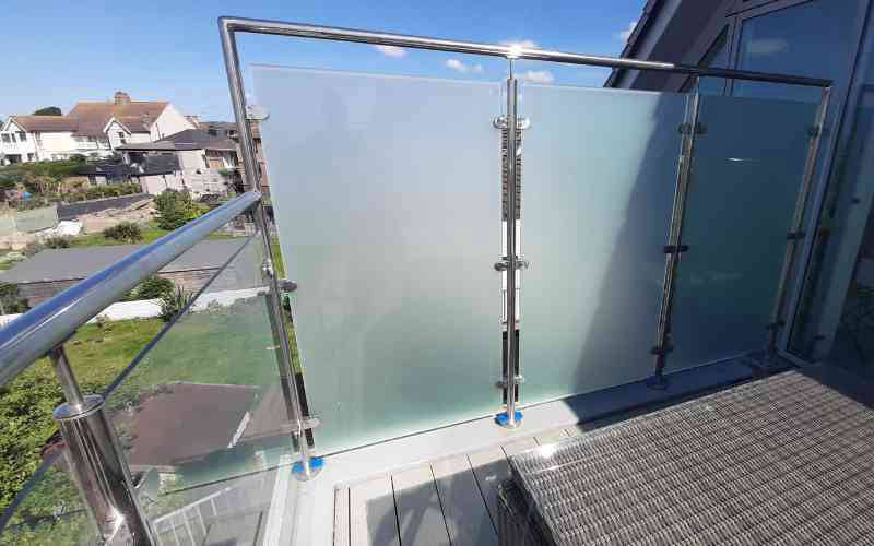 Etched privacy glass on stainless steel balustrade