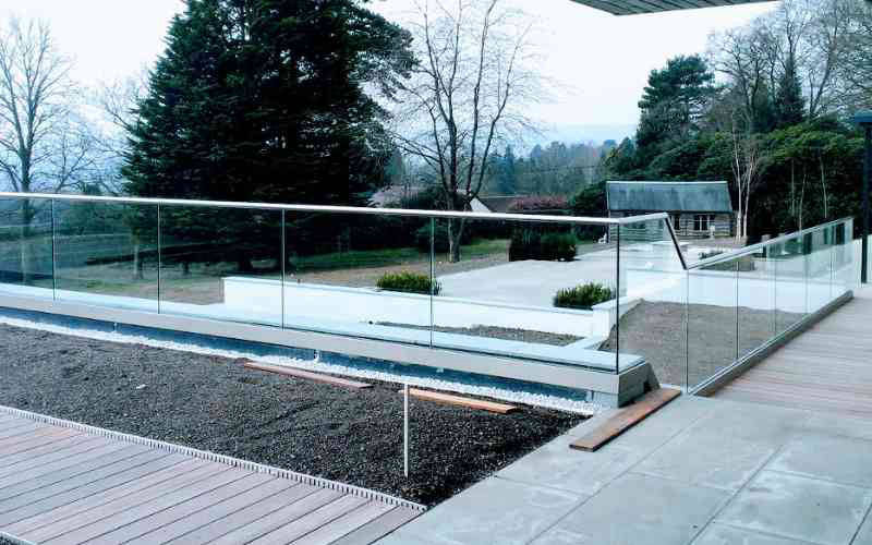Frameless glass balustrade with top rail