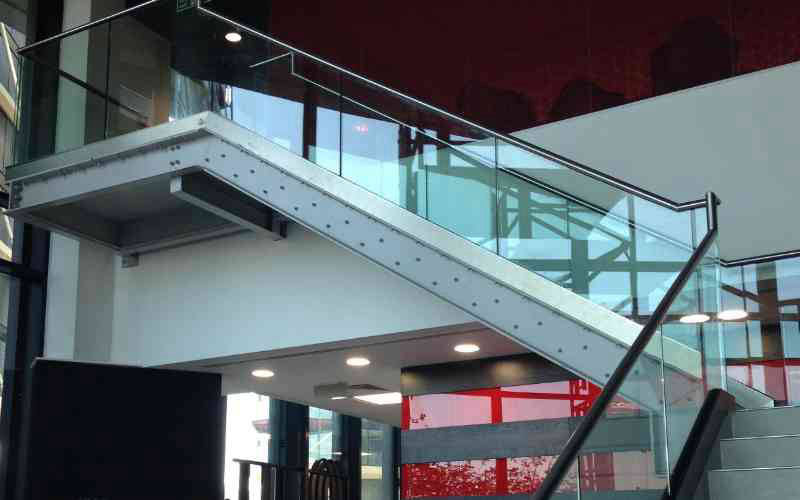 Frameless glass balustrade with top rail