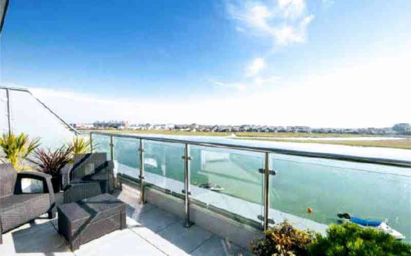 Stainless riverside glass railing system