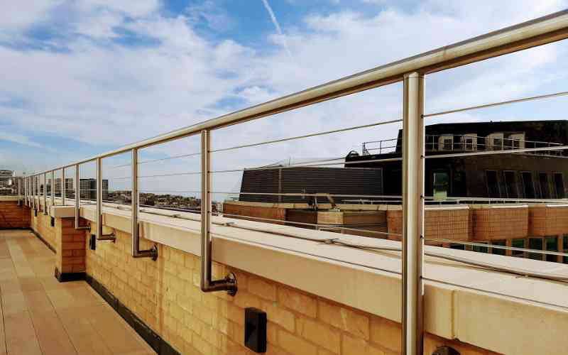 Commercial roof tension wire railing