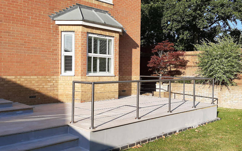 Low level tension wire decking balustrade